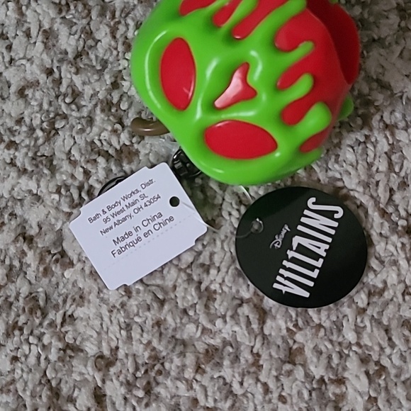 Disney Evil Queen Glow in the Dark Poison Apple Hand Sanitizer Keychain - Picture 2 of 3